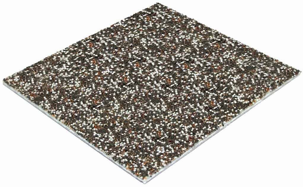 A brown and white speckled Grip Rock Freezer Floor Mat.